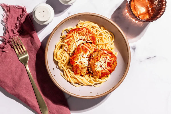 Eggplant Parmigiana Over Spaghetti Pasta